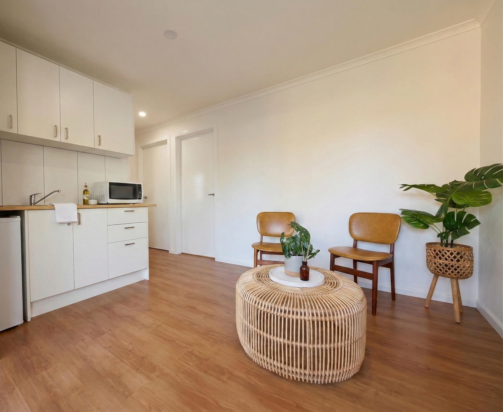 Kitchenette, dining, two bedrooms, added to the pre-existing structure
