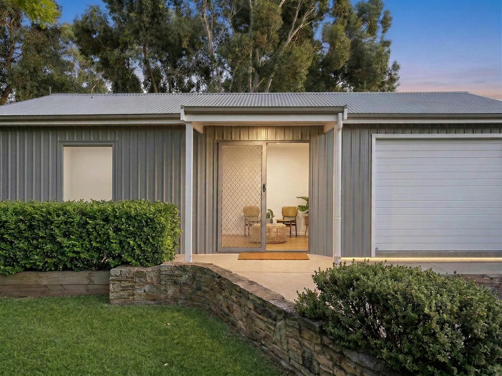 Shed converted to granny flat addition of garage door for workshop space
