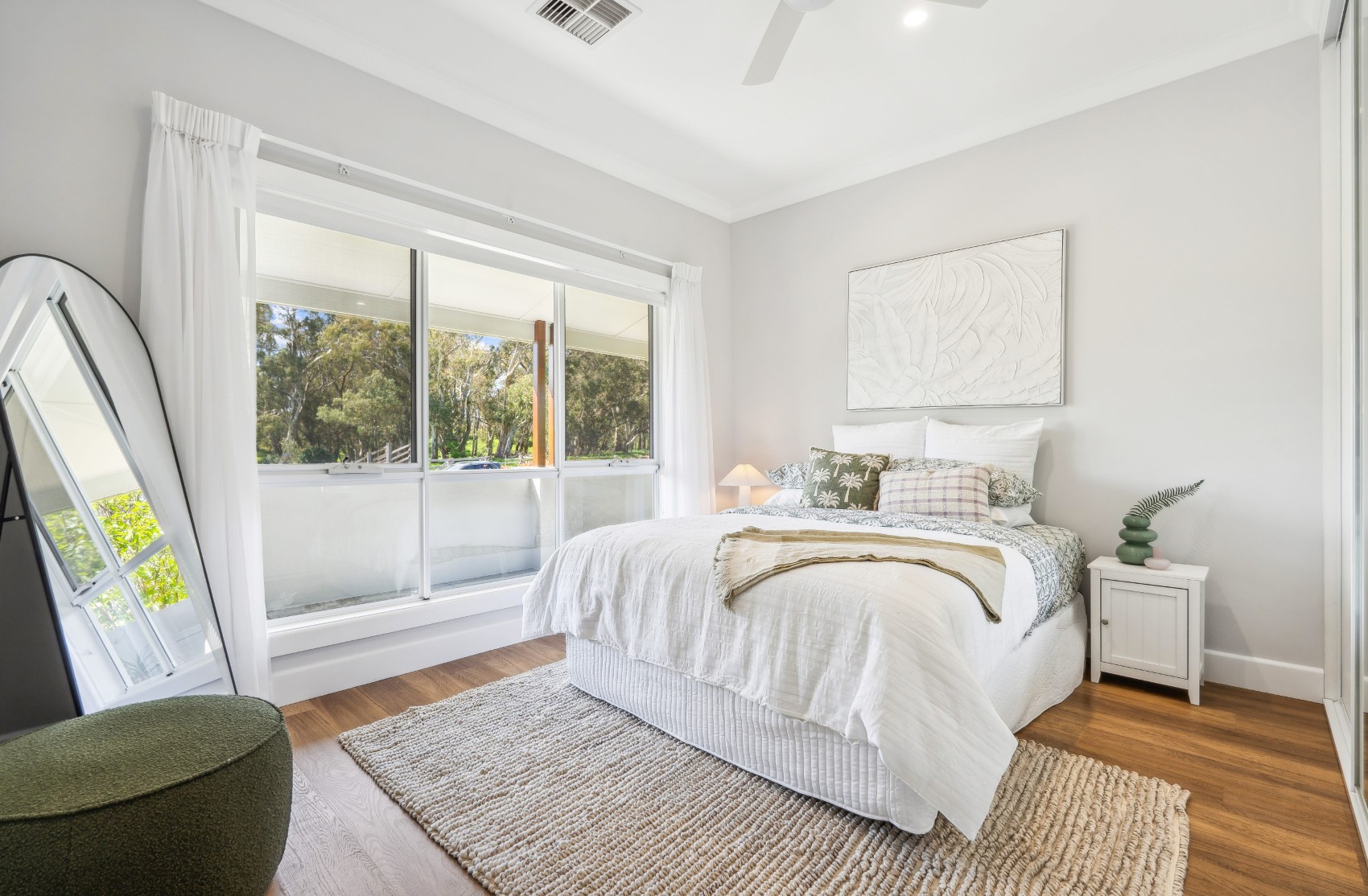 Bedroom opening to the verandah in the renovated Charleston home